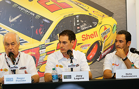 Roger Penske, Joey Logano, and Helio Castroneves