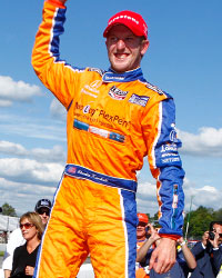 Charlie Kimball celebrates his victory