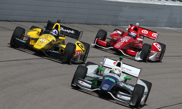 Simona De Silvestro leads Dario Franchitti and Scott Dixon during practice