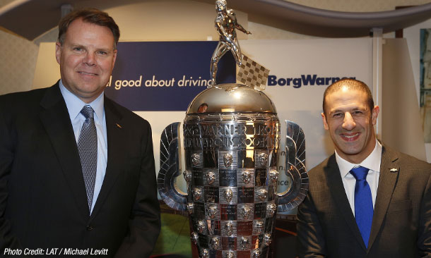 Tony Kanaan and Jim Campbell of Chevrolet