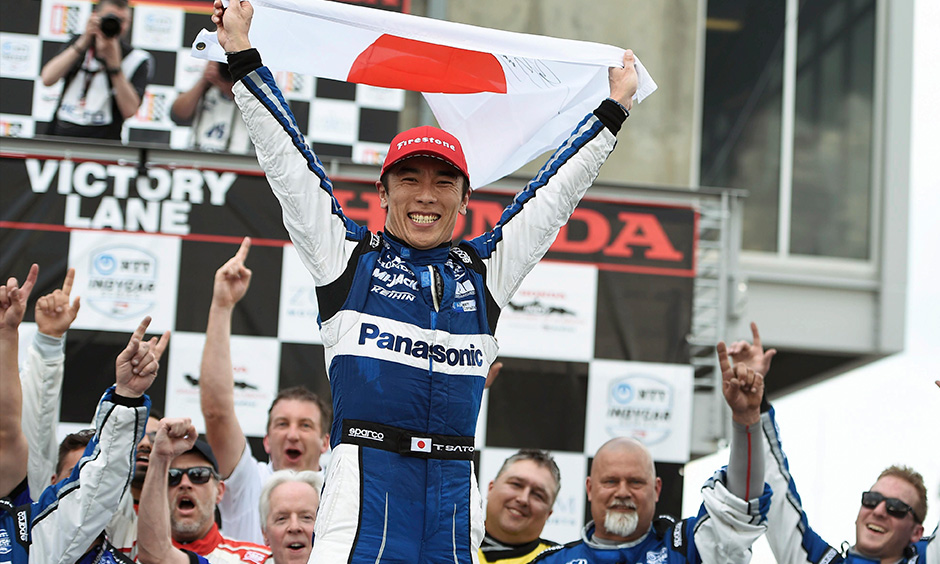 Takuma Sato with Japan flag