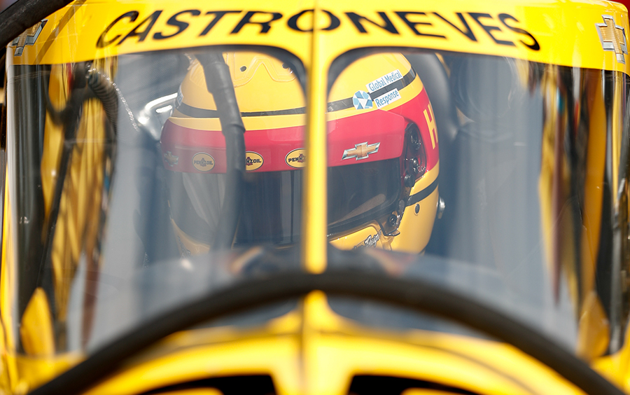 Helio Castroneves in his car at Indianapolis