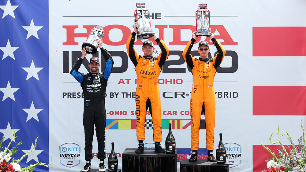 Kyle Kirkwood, Pato O'Ward, Christian Lundgaard on Mid-Ohio podium.
